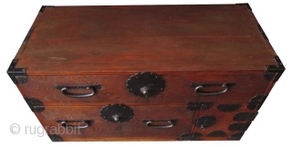 AntiqueJapanese Single Section Burl Keyaki Tansu
Japanese single section clothing tansu, with Kuri burl hardwood front drawers, iron lock plates with foliate edges, warabite pulls, fan-shaped iron corner hardware. The bottom corner has  ...