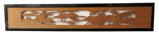 Antique Japanese Ranma (transom)
Antique Japanese wood ranma (transom) with a black lacquer frame. The center panel is carved with a landscape scene of a bridge with pine trees and rock formations. 

Dimensions:  ...