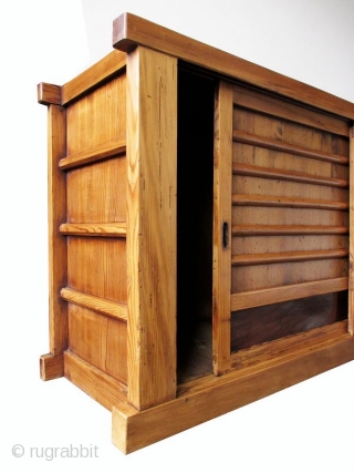 Japanese Antique Single Section Mizuya
Antique Japanese single section mizuya (kitchen tansu) made of sugi (crytomeria) wood and finished a light natural color. The large single compartment is opened by two sliding panels  ...