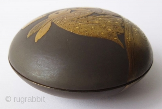 Charming 18th C. Japanese Lacquer Kogo with Rabbit Pounding Mochi
A round Japanese kogo or incense box with sprinkled gold lacquer maki-e motif of an anthropomorphic rabbit pounding mochi. The rabbit wears a  ...