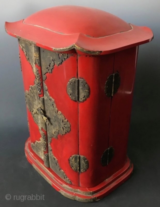 Japanese Red Lacquer Zushi Traveling Buddhist Shrine
Japanese Buddhist Zushi (portable shrine) with bright red lacquered wood exterior and gilt interior. Shrine with the statue of sitting Fudo Myoo, the fierce deity with  ...