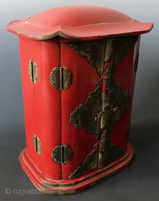 Japanese Red Lacquer Zushi Traveling Buddhist Shrine
Japanese Buddhist Zushi (portable shrine) with bright red lacquered wood exterior and gilt interior. Shrine with the statue of sitting Fudo Myoo, the fierce deity with  ...