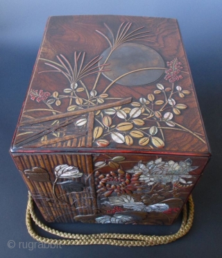 Japanese Antique Lacquered Keyaki Box with Garden Gate and Moon
An Exquisite antique Japanese large box made of keyaki (elm) wood burl and decorated with a design of a bamboo garden gate, tall  ...