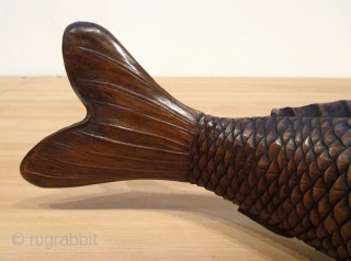 Antique Japanese Carved Okimono of Swimming Carp

Antique Japanese boxwood okimono of swimming carp fish with sinuously shaped body and realistically carved scales and details. Lovely soft patina of golden brown color. Good  ...