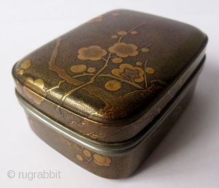 Japanese Lacquer Incense Box with Plum Blossoms
Japanese lacquer incense box with low-relief designs of plum blossoms in maki-e lacquer on finely sprinkled nashiji lacquer ground. The plum branch pattern is continuous along  ...