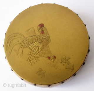 Exquisite 18th C. Japanese Lacq. Incense Box with Rooster and Chickens
Japanese incense box in the form of a flattened drum with realistic wood grain pattern in gold flake togidashi maki-e lacquer and  ...