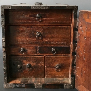 Antique Japanese Lacquered Fune Bako
Japanese dark lacquered fune bake, or ship safe box with heavy hand-forged iron hardware and plates. The interior of the box holds six small drawers opened by kan  ...