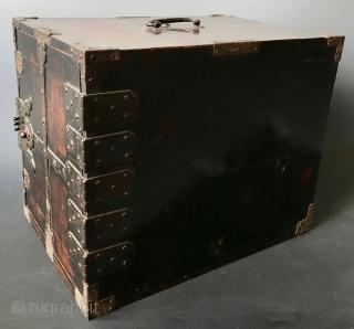 Antique Japanese Lacquered Fune Bako
Japanese dark lacquered fune bake, or ship safe box with heavy hand-forged iron hardware and plates. The interior of the box holds six small drawers opened by kan  ...