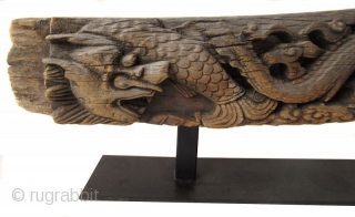 Massive Antique Chinese Architectural Wood Carving of Dragons
An incredibly large and heavy hand carved wood architectural piece, with high relief carved pair of dragons on either side of a central ball of  ...