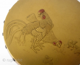 Exquisite 18th C. Japanese Lacq. Incense Box with Rooster and Chickens
Japanese incense box in the form of a flattened drum with realistic wood grain pattern in gold flake togidashi maki-e lacquer and  ...