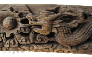 Massive Antique Chinese Architectural Wood Carving of Dragons
An incredibly large and heavy hand carved wood architectural piece, with high relief carved pair of dragons on either side of a central ball of  ...