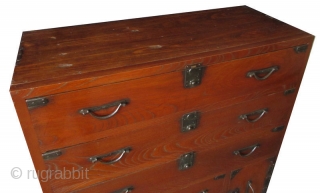 Antique Japanese Keyaki Front Tansu


Unusual Japanese single section isho tansu (clothing chest), with dramatic Keyaki (elm) front drawers, opened by simplistic hirute style handle pulls and small, squared locks. Its bottom safe  ...