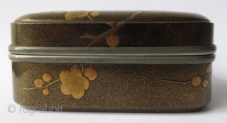 Japanese Lacquer Incense Box with Plum Blossoms
Japanese lacquer incense box with low-relief designs of plum blossoms in maki-e lacquer on finely sprinkled nashiji lacquer ground. The plum branch pattern is continuous along  ...