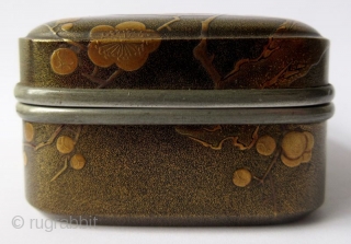 Japanese Lacquer Incense Box with Plum Blossoms
Japanese lacquer incense box with low-relief designs of plum blossoms in maki-e lacquer on finely sprinkled nashiji lacquer ground. The plum branch pattern is continuous along  ...
