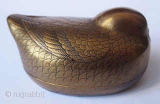 Antique Japanese Maki-e Lacquer Bird Kogo, Signed

Japanese kogo, or incense container for tea ceremonies, in the form of a small bird with very fine maki-e or sprinkled gold lacquer exterior. Each feather  ...