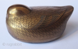 Antique Japanese Maki-e Lacquer Bird Kogo, Signed

Japanese kogo, or incense container for tea ceremonies, in the form of a small bird with very fine maki-e or sprinkled gold lacquer exterior. Each feather  ...