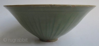 Antique Chinese Small Celadon Bowl


A small Chinese eggshell thin ceramic bowl with celadon green underglaze. The center of the bowl is incised with floral motifs and scrolls, and the outer edges are  ...