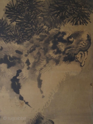 Japanese Painting of Tiger and the Moon


Antique Japanese painting of a tiger crouched on a rock, his eyes are turned toward the full moon which shows itself through the branches of a  ...