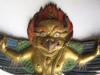 Tibetan Gilt Copper Repousse Figure of Garuda


A gilt copper repousse figure of Garuda, finely worked with outstretched wings, his hands in the Karan mudra or demon-expelling mudra. He wears long necklaces hanging  ...