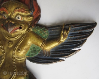 Tibetan Gilt Copper Repousse Figure of Garuda


A gilt copper repousse figure of Garuda, finely worked with outstretched wings, his hands in the Karan mudra or demon-expelling mudra. He wears long necklaces hanging  ...