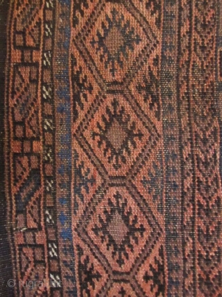 Antique Hand-Woven Persian Baluchi Rug
Z

Antique Persian Baluch rug, 100% hand woven wool in rust brown, light red, and indigo hues, with repeating geometric motifs throughout. These rugs are hand-knotted by the nomads  ...