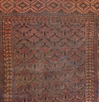 Antique Hand-Woven Persian Baluchi Rug
Z

Antique Persian Baluch rug, 100% hand woven wool in rust brown, light red, and indigo hues, with repeating geometric motifs throughout. These rugs are hand-knotted by the nomads  ...