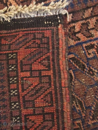 Antique Hand-Woven Persian Baluchi Rug
Z

Antique Persian Baluch rug, 100% hand woven wool in rust brown, light red, and indigo hues, with repeating geometric motifs throughout. These rugs are hand-knotted by the nomads  ...