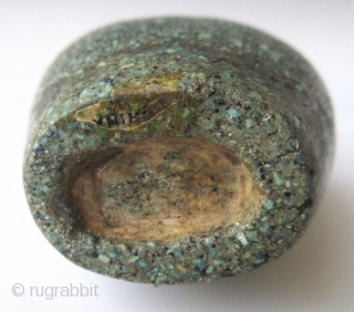 Antique Chinese Turquoise Encrusted Snuff Bottle

Antique Chinese snuff bottle of a flattened oval form with recessed foot, encrusted with finely crushed turquoise. The stopper has a jadeite lid with bright apple green  ...