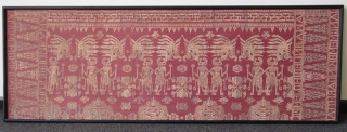 Framed Balinese Kampuh Songket Men's Ceremonial Wrapper

Antique framed Balinese kampuh songket, a men's ceremonial wrapper cloth, handmade with supplementary weft silk, cotton, gold and silver thread. The red ground cloth with gold  ...