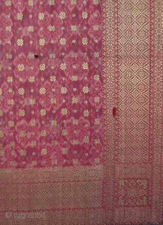 Antique Malaysian Palembang Songket Head Cloth

A mounted hand-woven Malaysian Songket head cloth from the Palembang region of South Sumatra. Weft ikat, supplementary weft weave, silk and gold thread with natural dye. The  ...