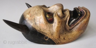 Antique Japanese Hannya Noh Mask

The Hannya (般若) mask in Noh theater represents a jealous female demon. She possesses two sharp bull-like horns, metallic gold eyes, and a leering mouth with jagged teeth.  ...