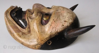 Antique Japanese Hannya Noh Mask

The Hannya (般若) mask in Noh theater represents a jealous female demon. She possesses two sharp bull-like horns, metallic gold eyes, and a leering mouth with jagged teeth.  ...