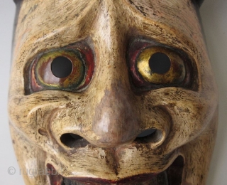 Antique Japanese Hannya Noh Mask

The Hannya (般若) mask in Noh theater represents a jealous female demon. She possesses two sharp bull-like horns, metallic gold eyes, and a leering mouth with jagged teeth.  ...