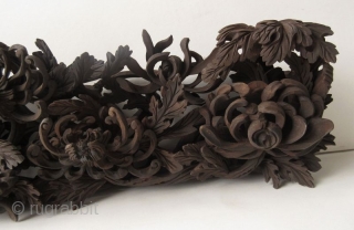 Antique Japanese Carved Panel of Chrysanthemums


Beautiful hand carved Japanese wood panel with stylized openwork carvings of various scrolling chrysanthemums and peonies. Each flowing one to the next layer out longitudinally on a  ...