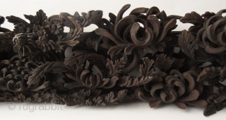 Antique Japanese Carved Panel of Chrysanthemums


Beautiful hand carved Japanese wood panel with stylized openwork carvings of various scrolling chrysanthemums and peonies. Each flowing one to the next layer out longitudinally on a  ...