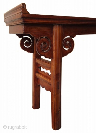 Antique Chinese Hardwood Altar Table

Antique Chinese hardwood altar table with hand carved lingzhi spiral apron joined in upturned flanges. The feet are spanned by an openwork of hand carved panels with drapery  ...