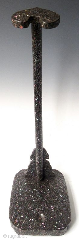 Antique Japanese Inlaid Laquer Sword Stand

Japanese tachi-kake or samurai's sword stand, black lacquered and rich intricate shell inlay work, with a reishi mushroom shaped finial. 

Edo period (1603-1868) 

Dimensions: 10 1/4" x  ...