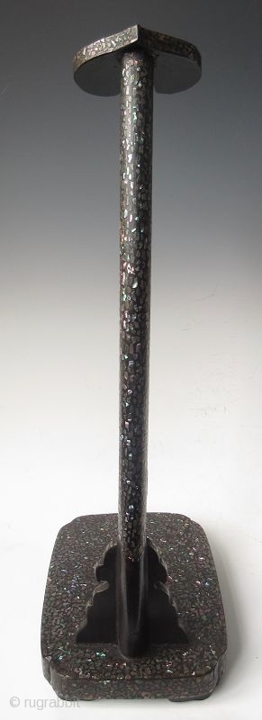 Antique Japanese Inlaid Laquer Sword Stand

Japanese tachi-kake or samurai's sword stand, black lacquered and rich intricate shell inlay work, with a reishi mushroom shaped finial. 

Edo period (1603-1868) 

Dimensions: 10 1/4" x  ...