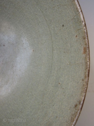 Antique Korean Koryo Celadon Bowl

Antique Korean Koryo bowl with celadon glaze and crackling, the small recessed well with carved outline, the exterior body of the bowl carved with repeating lotus petals, and  ...