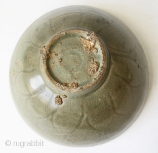 Antique Korean Koryo Celadon Bowl

Antique Korean Koryo bowl with celadon glaze and crackling, the small recessed well with carved outline, the exterior body of the bowl carved with repeating lotus petals, and  ...