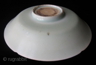 Antique Chinese Qingbai Foliate Dish

Chinese Celadon Qingbai dish, with foliate edges and petal form walls framing the well. The center well is incised with a blossoming flower motif. The foot is slightly  ...