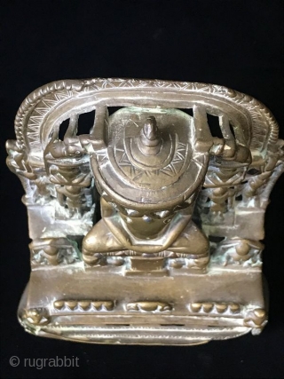 17th Century Silver Inlaid Brass Jain Shrine

Ancient Indian Jain religious shrine, the central Jina surrounded by multiple celestial nymphs with two elephants at the top on either side of the parasol. This  ...