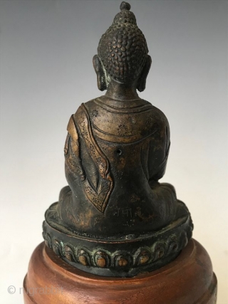 19th Century Sino Tibetan Seated Buddha

Bronze Buddha from Sino Tibetan tradition. Wonderful details on the robe with inscription on back. Buddha sits on a wooden stand. Provenance: From the William Ashby Estate.  ...