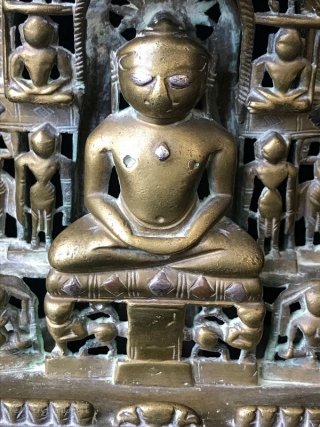 17th Century Silver Inlaid Brass Jain Shrine

Ancient Indian Jain religious shrine, the central Jina surrounded by multiple celestial nymphs with two elephants at the top on either side of the parasol. This  ...