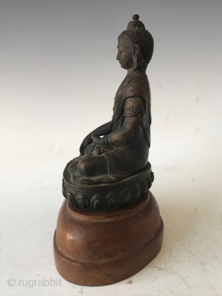 19th Century Sino Tibetan Seated Buddha

Bronze Buddha from Sino Tibetan tradition. Wonderful details on the robe with inscription on back. Buddha sits on a wooden stand. Provenance: From the William Ashby Estate.  ...