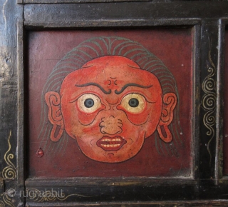 Rare 18th Century Tibetan Buddhist Painted Altar Cabinet

Rare Tibetan hand-painted lacquer altar cabinet. Original finish with patina. The front three panels depict three faces. The left face has red skin and green  ...