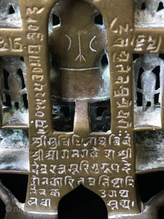 17th Century Silver Inlaid Brass Jain Shrine

Ancient Indian Jain religious shrine, the central Jina surrounded by multiple celestial nymphs with two elephants at the top on either side of the parasol. This  ...