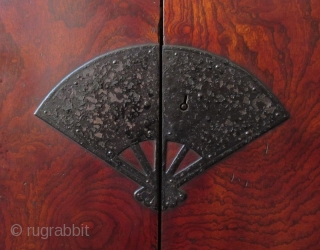 Rare Antique Japanese Solid Keyaki Burl Fan Lock Tansu

A rare and unusual Japanese Keyaki burl choba tansu with original dark red translucent lacquer finish. The front of the chest has two hinged  ...