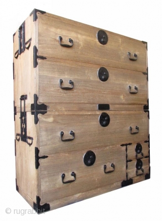 Japanese Antique 2-section Kiri Isho Tansu

Antique Japanese isho tansu (chest on chest for clothing), made all of kiri (paulownia) wood. The top section has two large drawers while the bottom section has  ...