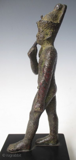 Rare Antique Egyptian Bronze Walking Nobleman

Rare Antique bronze figure of a nude nobleman in walking pose, his pointer finger of his right hand resting up against his chin, with green patina and  ...